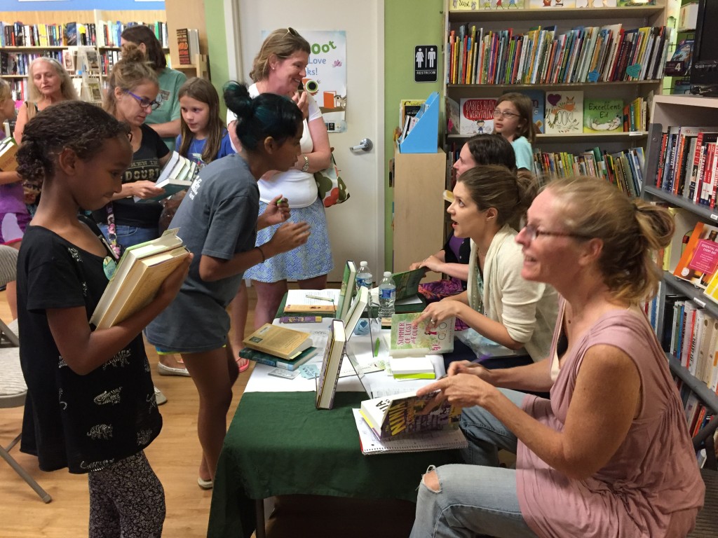 Tara Rebecca and Jen Signing books July